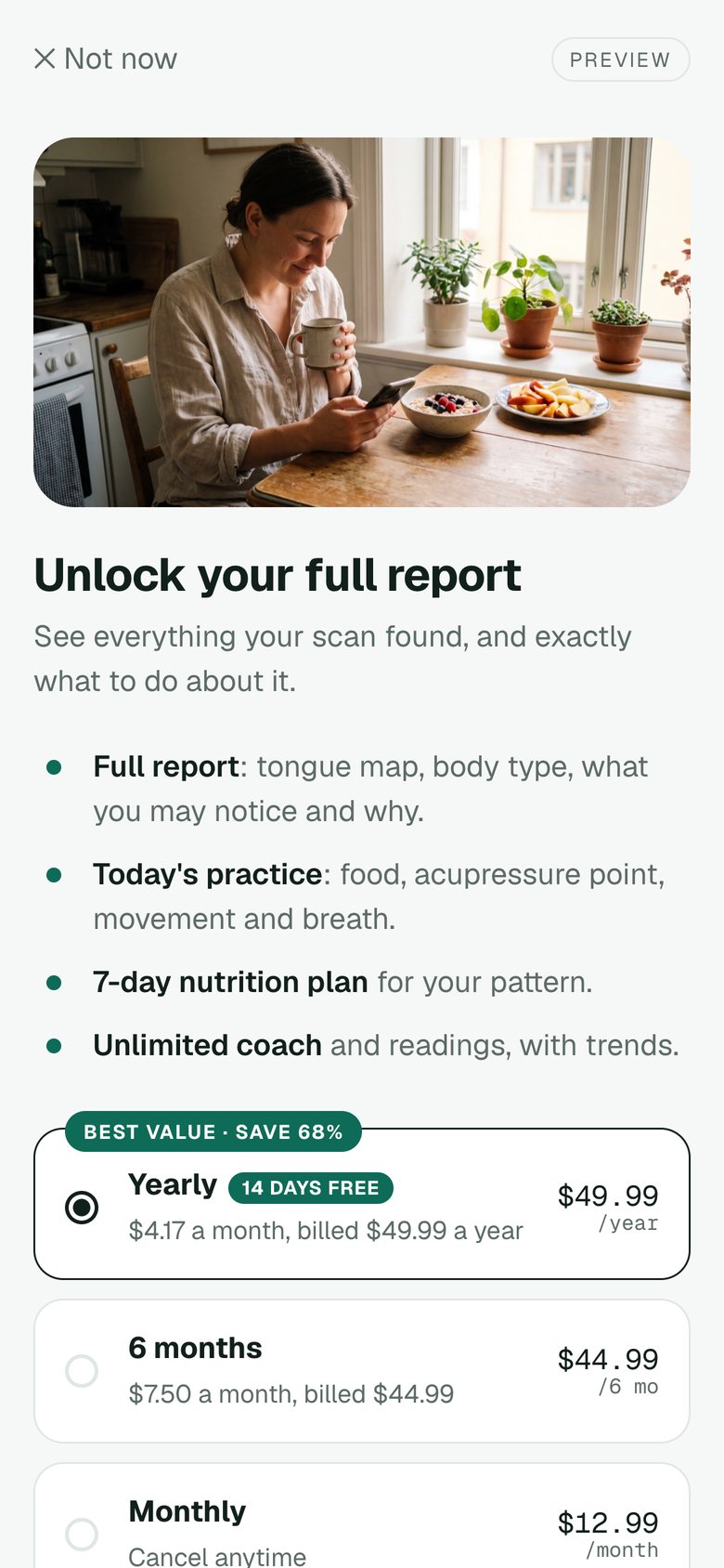 The Qira plan screen in the app: Yearly with a 14-day free trial, 6 months and Monthly